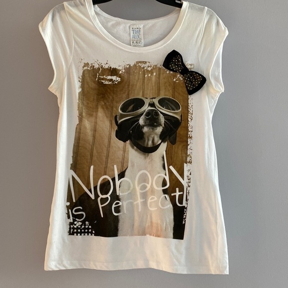 Zara tee shirt. Cute dog print on front. Scoop neck short sleeves soft Medium.
C - Picture 1 of 5